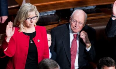 Then-Representative-elect Liz Cheney (R-Wyo.) takes the oath of office, with her father Dick Cheney by her side.