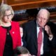 Then-Representative-elect Liz Cheney (R-Wyo.) takes the oath of office, with her father Dick Cheney by her side.