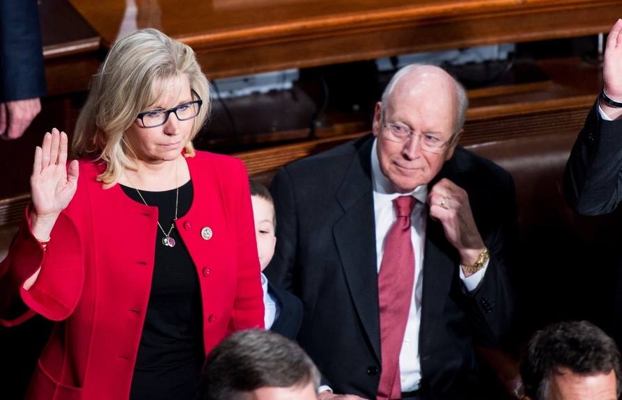 Then-Representative-elect Liz Cheney (R-Wyo.) takes the oath of office, with her father Dick Cheney by her side.