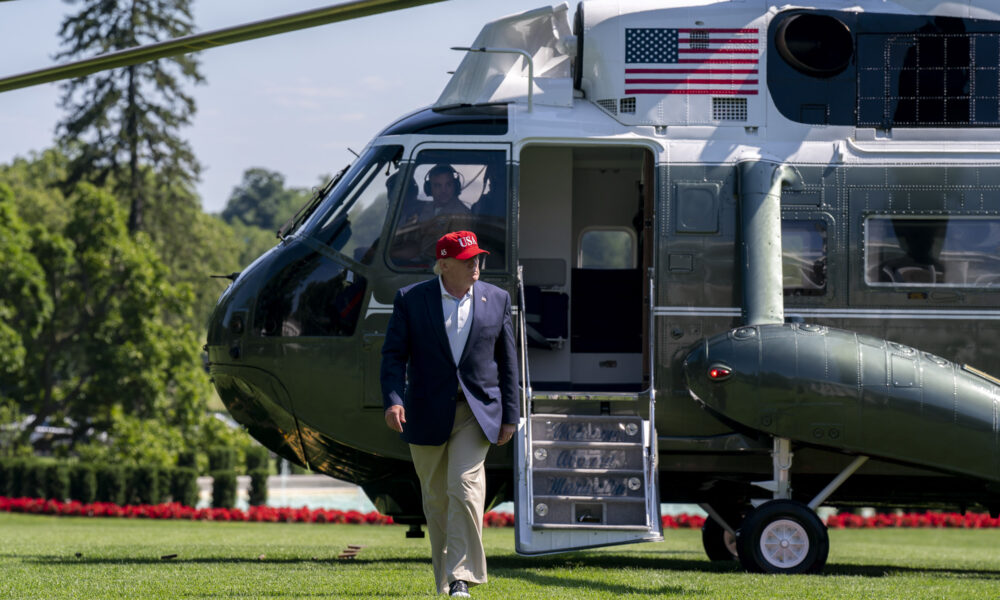 President Donald J. Trump steps off his Marine One VH-3D Sea King after touchdown at Camp David in Maryland.