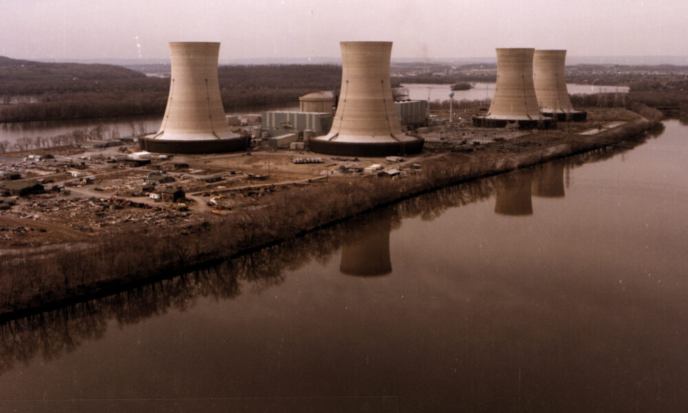 Three Mile Island, showing the containment building and four cooling towers of the nuclear power plant that bears the island's name