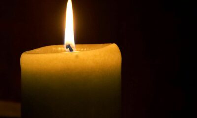 A candle flame in the dark