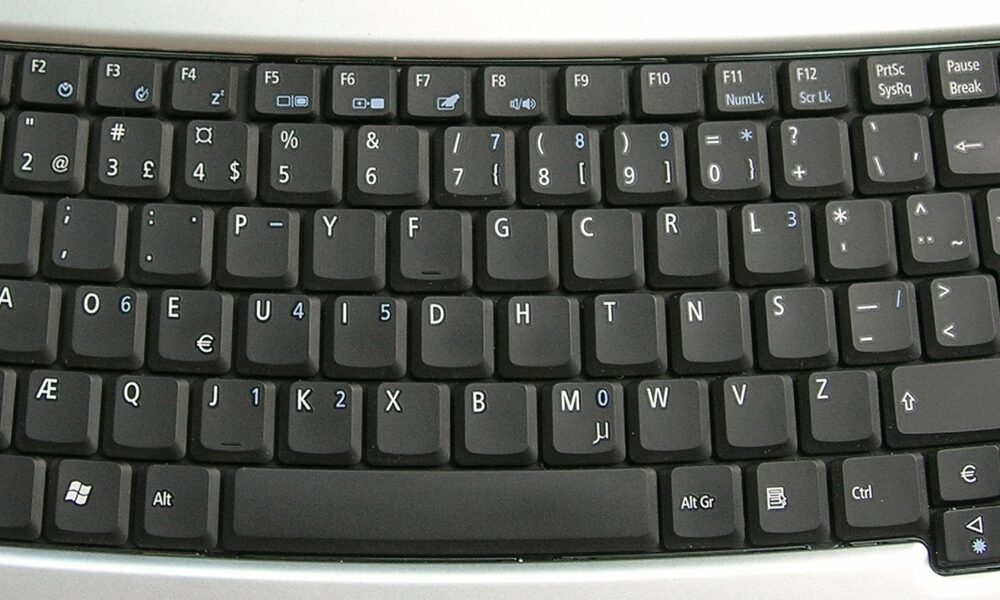 A Dvorak computer keyboard, sporting a more efficient layout and presence of special characters, useful for writing software