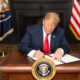 Donald Trump signs an Executive Order imposing sanctions on Iran on 5 August 2018