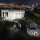 The White House and the West Wing, aerial view looking down Pennsylvania Avenue toward the Capitol