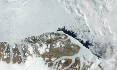 Greenland, overflying some of its mountains