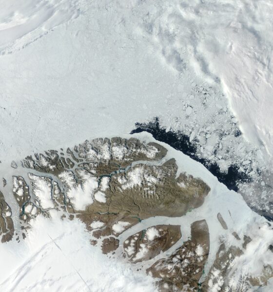 Greenland, overflying some of its mountains