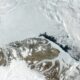 Greenland, overflying some of its mountains