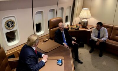 President Donald Trump talks with Senators Rick Scott and Marco Rubio (both of Florida) about the Venezuela situation. Aboard Air Force One, in the Flying Presidential Office.