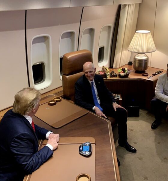 President Donald Trump talks with Senators Rick Scott and Marco Rubio (both of Florida) about the Venezuela situation. Aboard Air Force One, in the Flying Presidential Office.