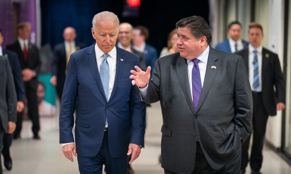 President Joe Biden and Gov. J. B. Pritzker (D-Ill.) speak together on July 7, 2021