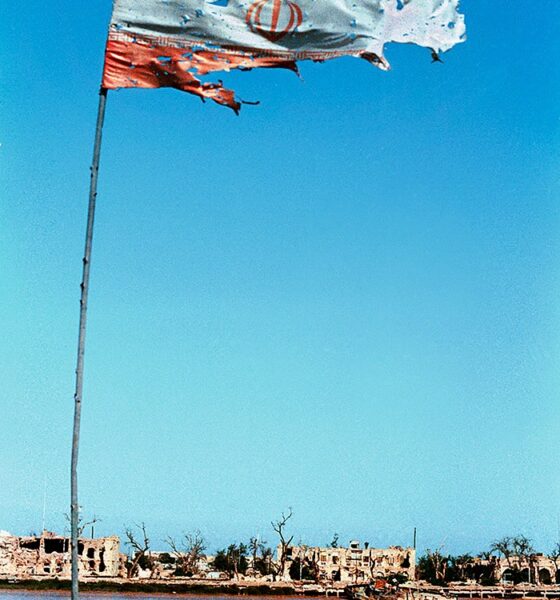 Threadbare flag of Iran flying at Khorramshahr