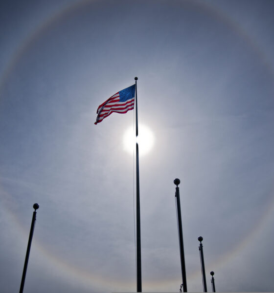Solar halo surrounds American flag flying outside Building 1 at Eglin Air Force Base, Florida