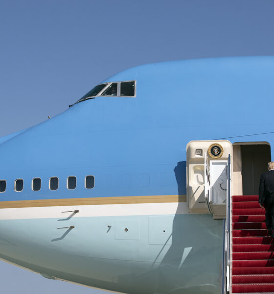 President Donald J. Trump mounts the stairs to his VC-25A transport at Joint Base Andrews