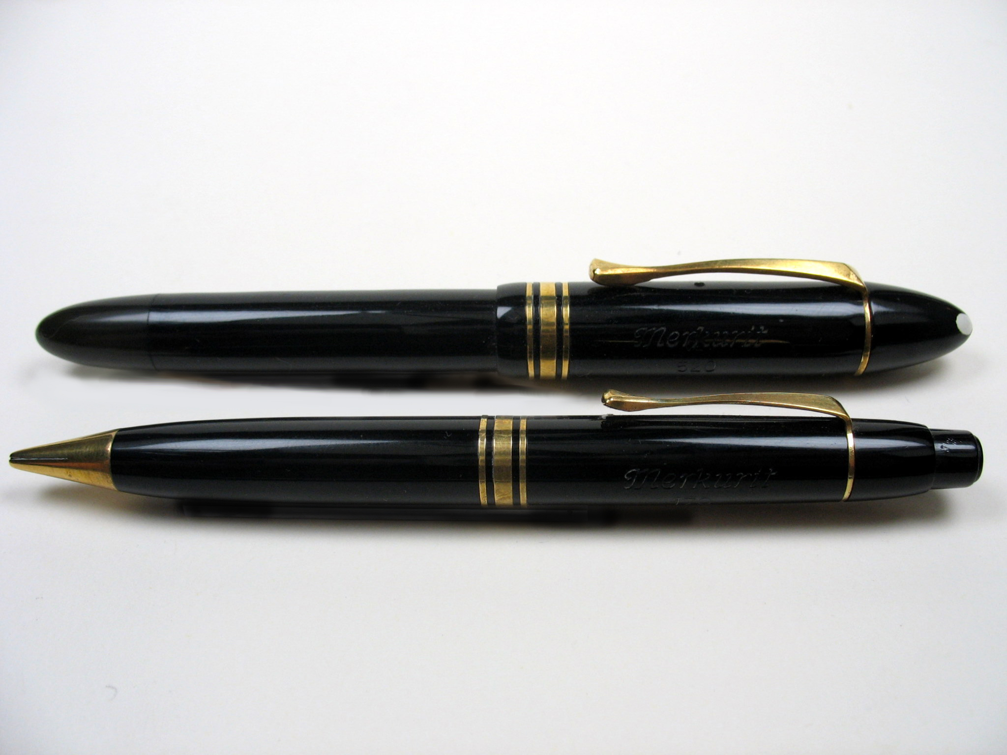 A pen and pencil, part of a 1950s era desk set