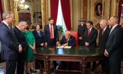 President Donald Trump signs several documents on his Second Inauguration Day