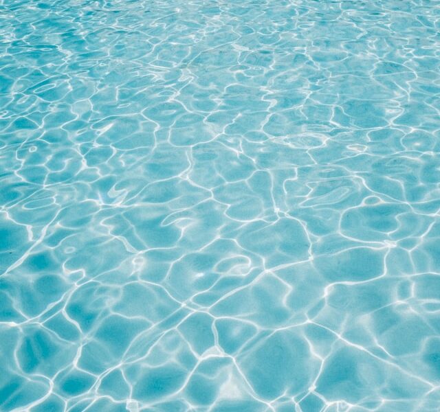 Rippling crystal blue water typical of a swimming pool