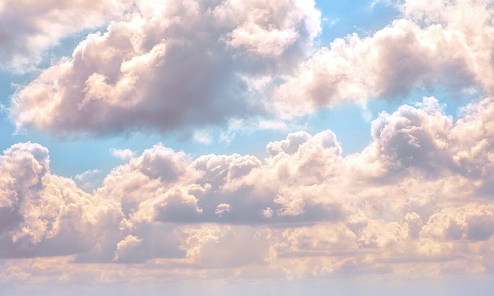 A partly cloudy sky demonstrating scattering of natural sunlight