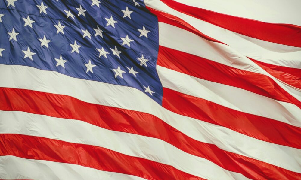 A USA flag waving - photo courtesy Joshua Hoehne