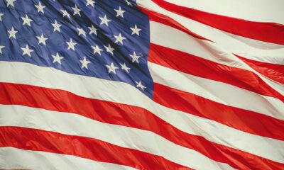 A USA flag waving - photo courtesy Joshua Hoehne