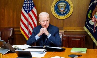 Joe Biden as President seated at the desk in the Presidential office at Camp David