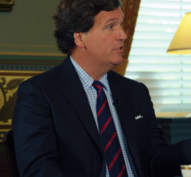 Tucker Carlson appears with Charlie Kirk