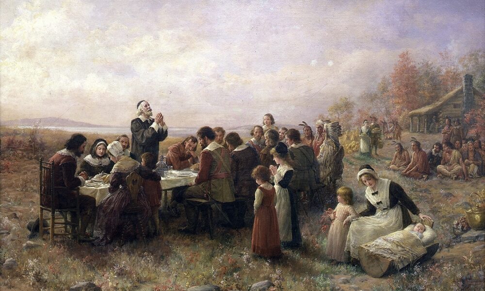 The first Thanksgiving feast - landscape painting by Brownscombe