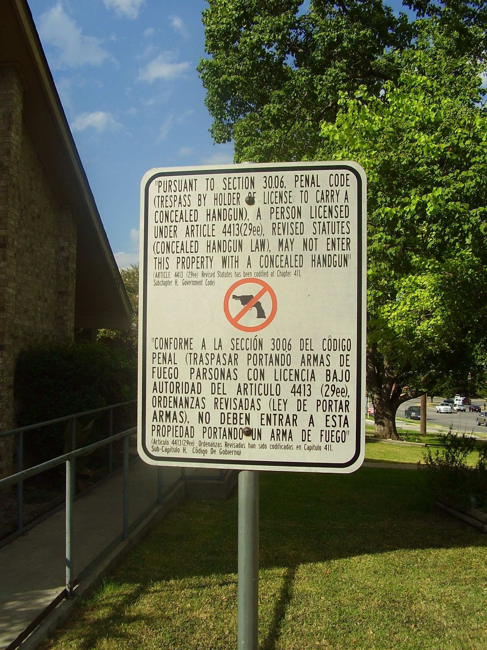 A property in Austin, Texas displays a private gun-free zone sign