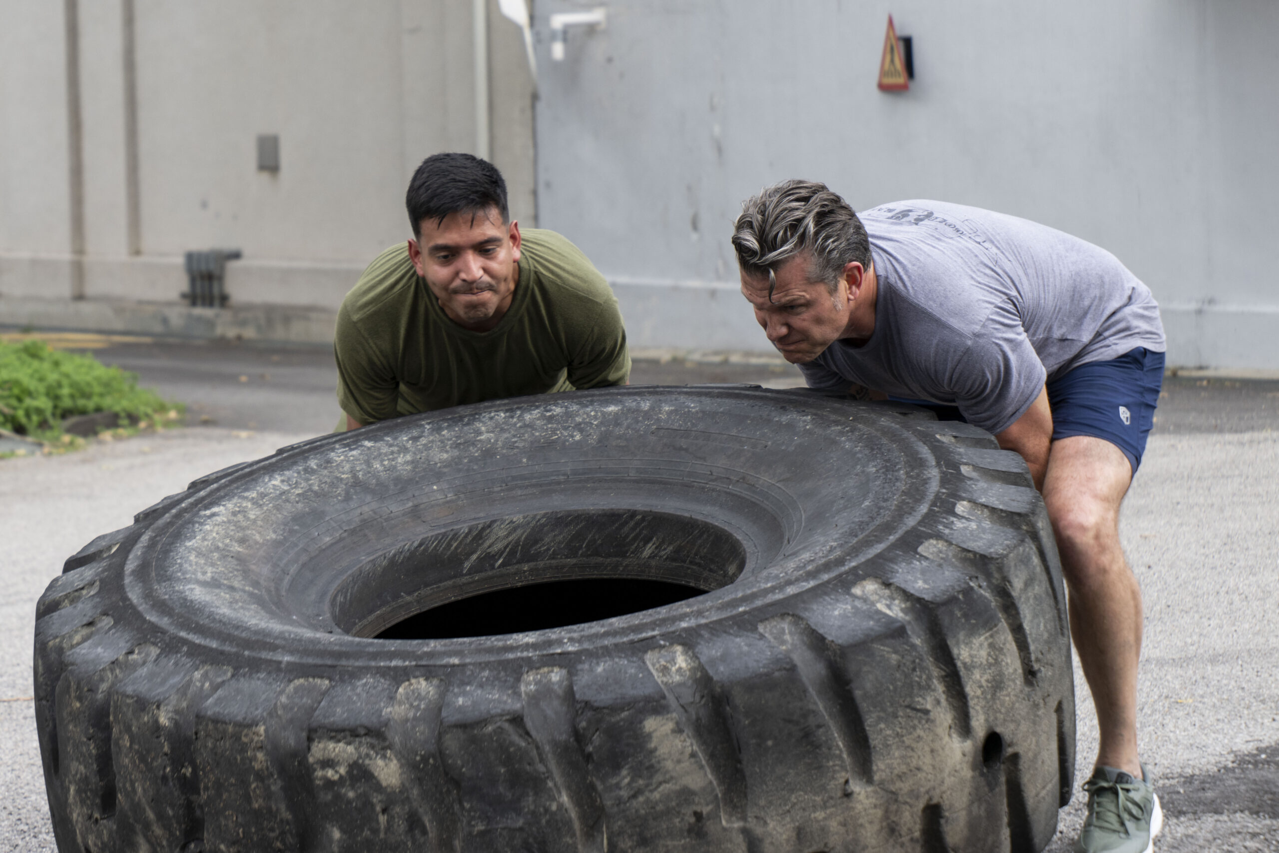 Pete Hegseth and staff take part in physicial training in Kuala Lumpur