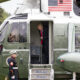 President Donald Trump aboard the Marine One VH-3D Presidential helicopter landing on the South Lawn