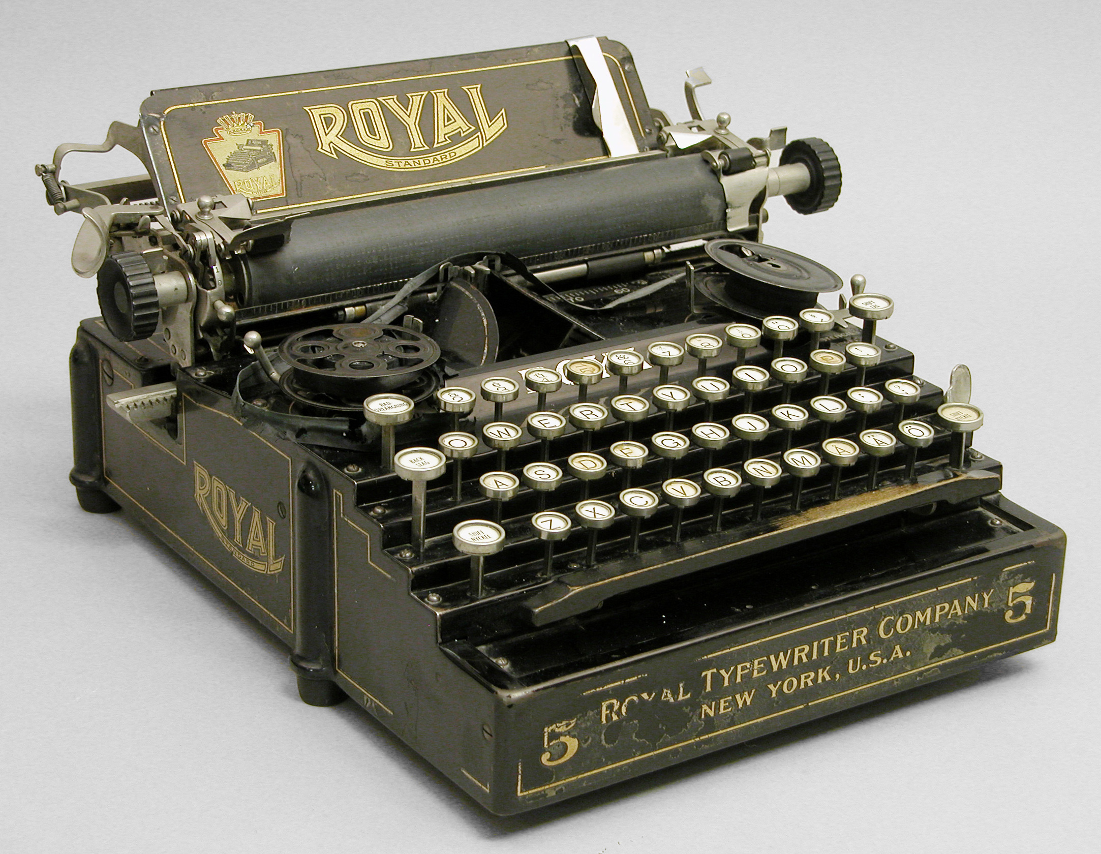An early model of a typewriter, a traditional academic tool