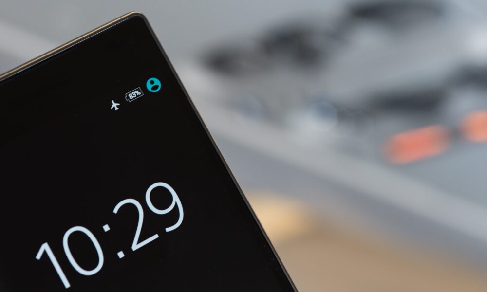 A smartphone display screen, showing the time and that the phone is in "airplane mode" with 83 percent battery charge