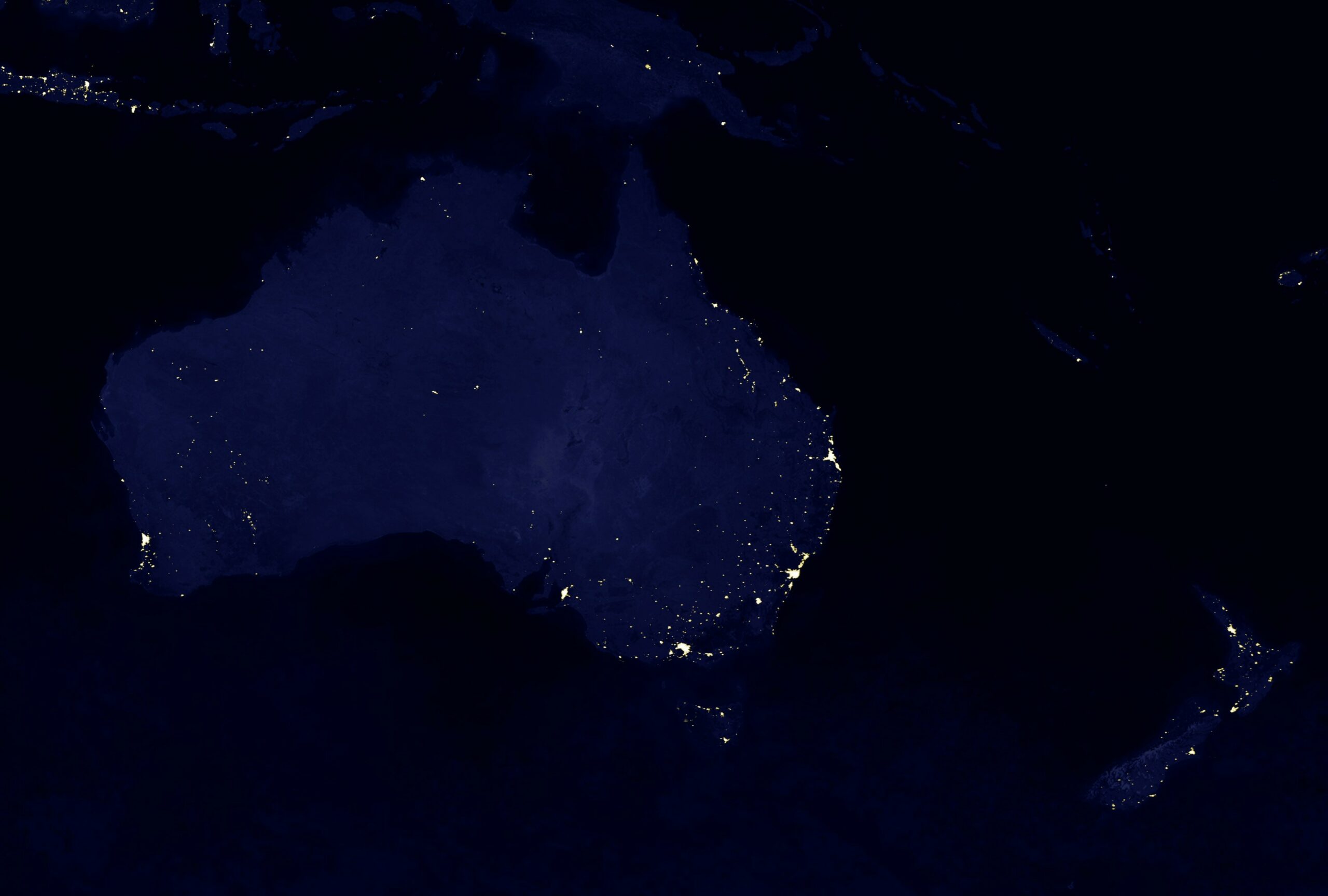 Satellite image of Australia at night, showing especially the population centers of Sydney, Melbourne, Perth, and Canberra.