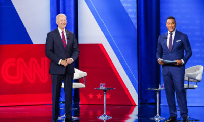 Don Lemon running a CNN Town Hall with President Joe Biden on stage