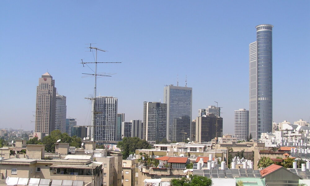 Tel Aviv skyline. Note the passive solar water heaters.