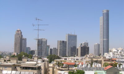 Tel Aviv skyline. Note the passive solar water heaters.