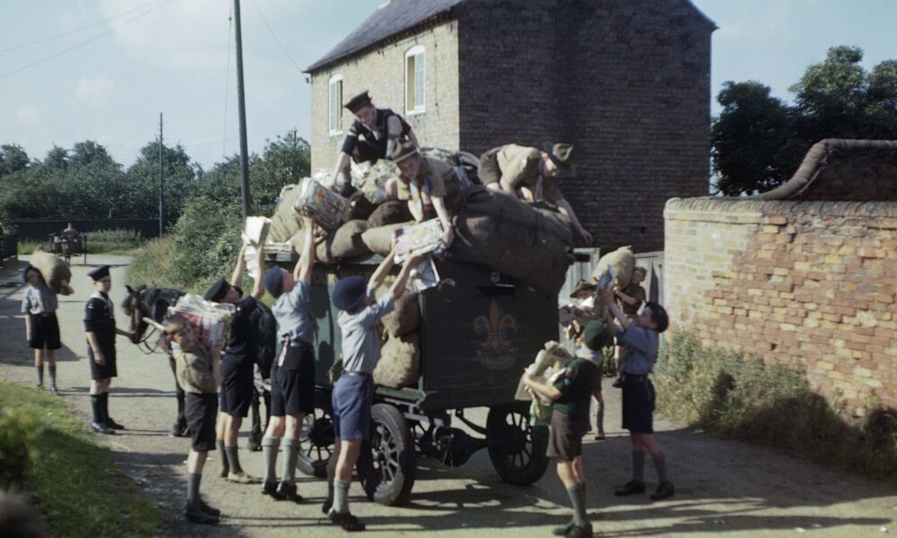Boy Scouts, Cubs, and Sea Scouts collect recyclable paper in 1944