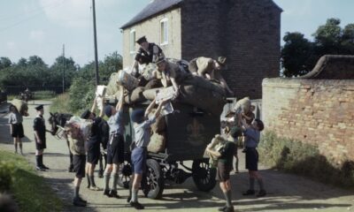 Boy Scouts, Cubs, and Sea Scouts collect recyclable paper in 1944
