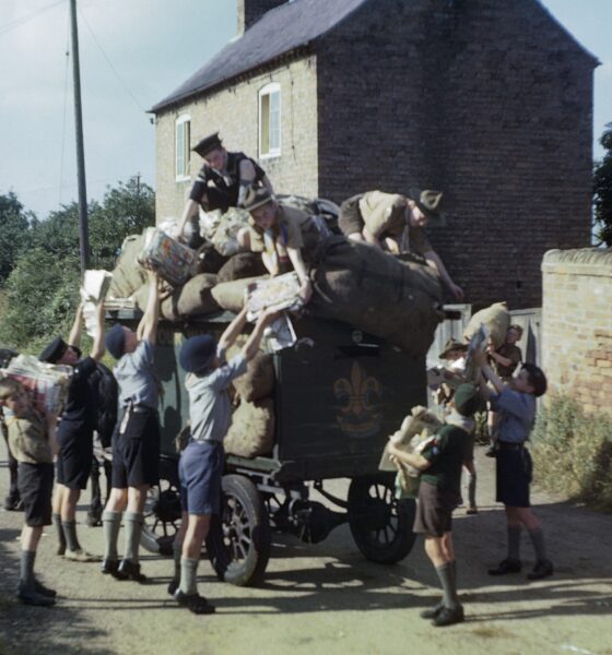 Boy Scouts, Cubs, and Sea Scouts collect recyclable paper in 1944