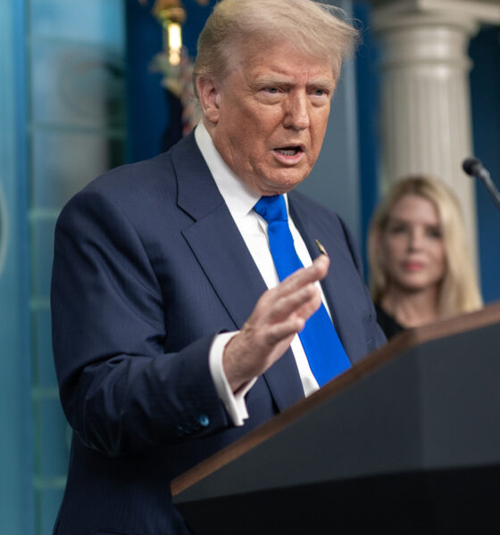 Trump holds a press conference with then Attorney General Pam Bondi in the background