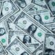 Photo of one-dollar bills by Alexander Gray on Unsplash