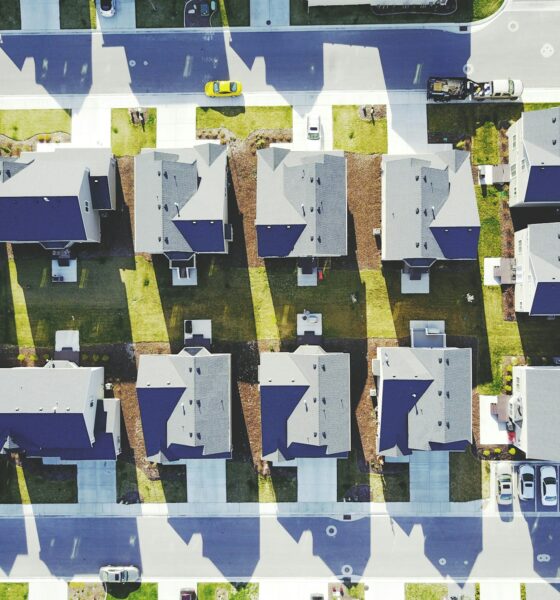 Cookie-cutter housing looking down from a traffic helicopter - by Blake Wheeler on Unsplash