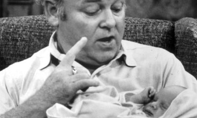 Archie Bunker sits in his favorite chair making a point, in a rare snapshot published without a copyright notice at a time when copyright notices mattered