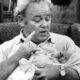 Archie Bunker sits in his favorite chair making a point, in a rare snapshot published without a copyright notice at a time when copyright notices mattered
