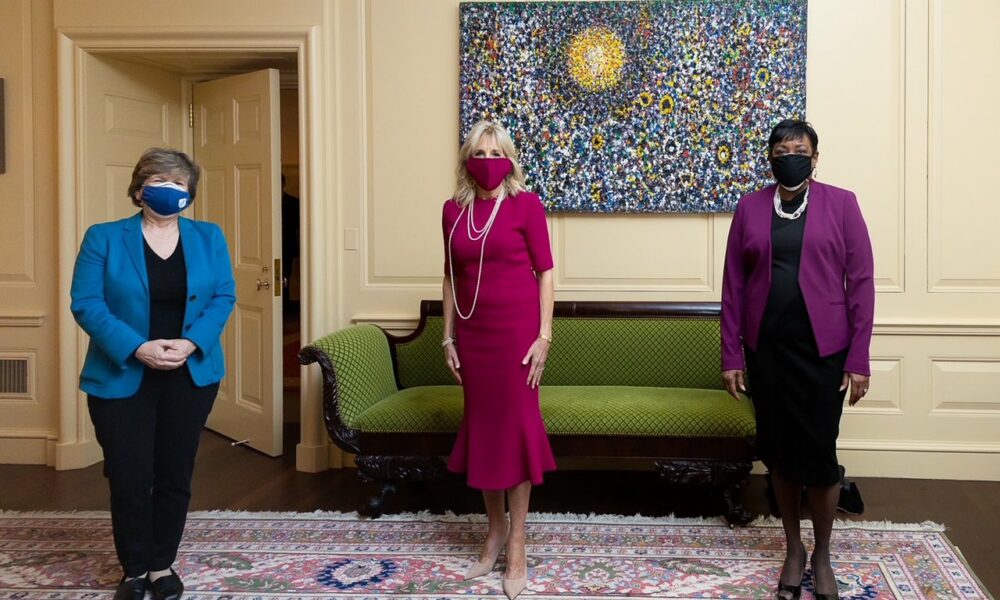 Randi Weingarten, Jill Biden EdD, and Becky Pringle, all wearing color-coordinated masks.