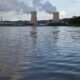 Two nuclear power plant cooling towers across a river, courtesy U.S. Fish and Wildlife Commission