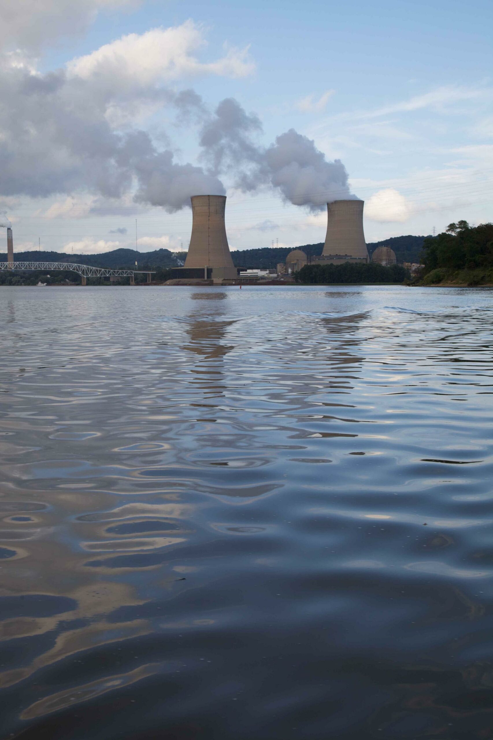 Two nuclear power plant cooling towers across a river, courtesy U.S. Fish and Wildlife Commission