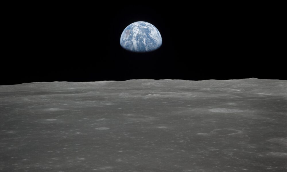 Earth rise over the Moon from Apollo XI
