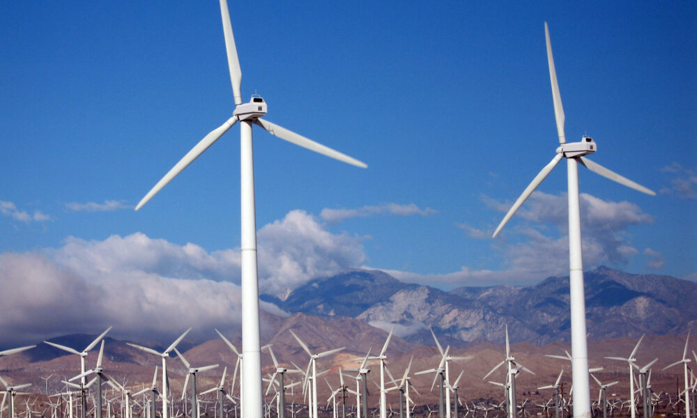 A wind farm with many active wind turbines