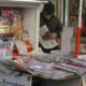 A newsstand, with multiple legacy news organs for sale